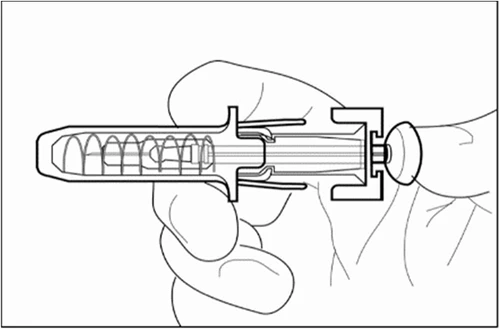 Line drawing of a hand holding a cylindrical medical device with an internal spring and a terminal button on the right