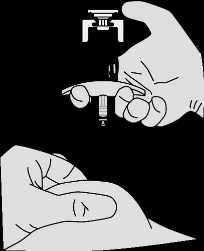 Black and white illustration showing a hand holding a syringe with a cap and a needle