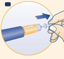 Una mano gira una tapa transparente hacia la derecha en un dispositivo médico cilíndrico de color azul y beige, indicado por una flecha azul