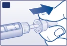 A hand holding an injective pen and moving it to the right to prepare the device