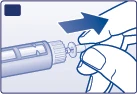 A hand holding an injector pen and