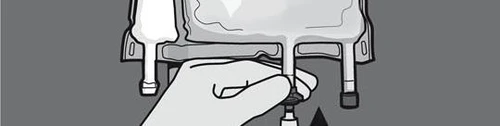 A hand grasping and rotating the bottom part of a medical vial connected to tubes and administration devices on a gray background