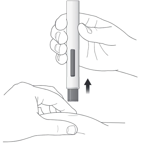 A hand holding a pen-shaped medical device vertically above the skin of an arm to prepare for