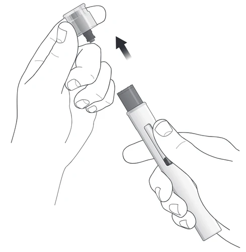Two hands separating a transparent cap from the body of a pen-shaped medical device with a black arrow pointing toward the