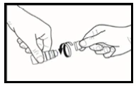 Two hands separating the components of a medical device, with a cylindrical part on the left and a circular cap on the right