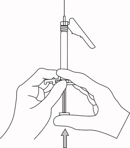 Two hands holding a syringe vertically while an arrow indicates upward movement