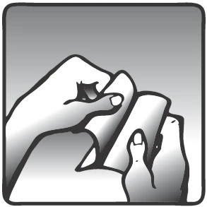 Two hands carefully holding and opening a medical package or wrapper to remove its contents