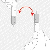 Diagram przedstawiający ruch obrotowy strzykawki, z czerwoną zakrzywioną strzałką wskazującą obrót między dwoma pozycjami pionowymi