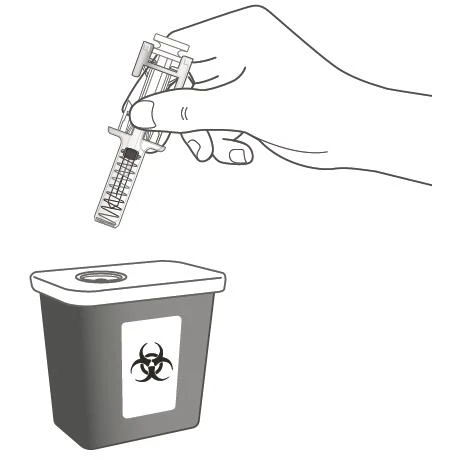 A hand holds a syringe above a biohazard waste container with the biohazard symbol for safe disposal