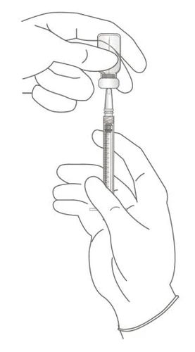 Two hands holding a syringe with the