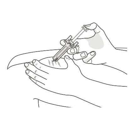 A hand holds a syringe to inject medication while the