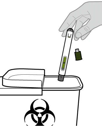 Ręka trzymająca białą długopisową wtryskarkę nad pojemnikiem na odpady biologiczne z czarnym symbolem zagrożenia biologicznego