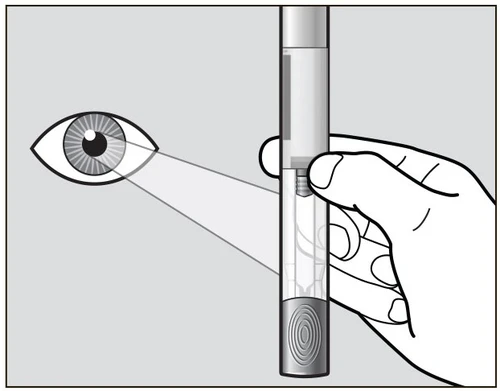 A hand holding an injection pen while a visual line connects the