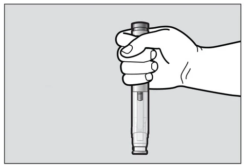 A hand holding vertically a medical injection pen with the thumb pressing the top part of the device