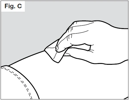 A hand applying a bandage or dressing to the upper part of a limb or body area, with dashed outline lines