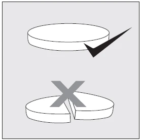 Schematic drawing of a whole tablet with a black checkmark and a broken tablet with a large gray cross over it