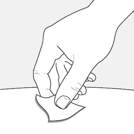 Line drawing of a hand applying a bandage or small adhesive patch onto a flat, light-colored surface
