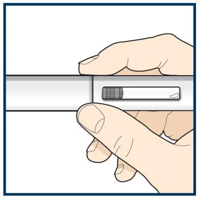 Two hands holding a white cylindrical medical device with a small rectangular window showing an internal graduated scale