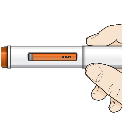 A hand holding a white injection pen horizontally with a transparent reservoir showing an orange-colored liquid