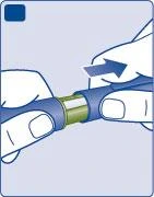 Two hands holding a cylindrical medical device in blue and green while an arrow indicates a pulling motion to the right