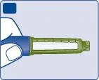 A hand holding horizontally a medical injection pen with a green body and blue grip on a light background