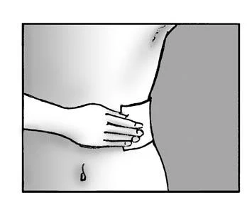 Una mano presiona suavemente la piel de la
