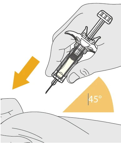 A hand holding a syringe ready for administration