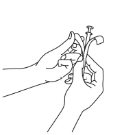 Black line drawing showing two hands handling a syringe with a needle and protective cap for drug preparation