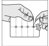 Two hands folding a rectangular sheet with four small circles arranged along a horizontal dashed line and a downward arrow