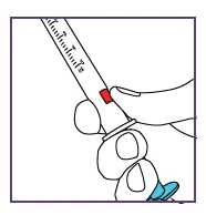 A hand holding a graduated syringe with a red indicator to adjust the dosage of liquid medication