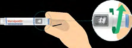 Рука держит устройство Yorvipath, зелёная стрелка указывает вращательное движение к