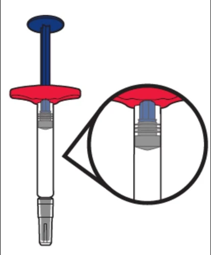 Diagram urządzenia medycznego z niebieskim tłoczkiem, czerwonym dnem i przezroczystym cylindrem z powiększonym szczegółem górnej części cylindra