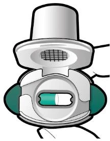Stylized illustration of a circular white medical device with a central green and white indicator and small black details