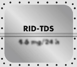 Gray rectangular panel with black text RID-TDS and blurred text below, surrounded by a row of small black dots on a light background