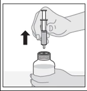 A hand holding a syringe vertically above the opening of a vial with liquid, a black arrow pointing upward indicating the motion of withdrawing the syringe