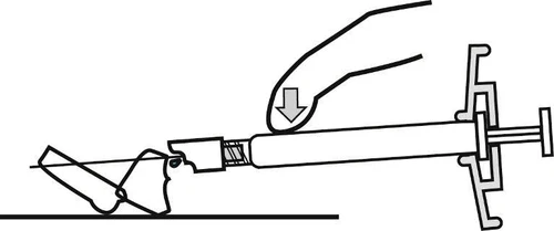 Finger pressing the plunger of a syringe, expelling fluid through a needle directed toward a surface at an angle, with the hand stabilizing the device