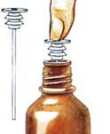 Hand holding a plunger with a rubber seal, prepared to insert it into the neck of a brown glass medicine bottle