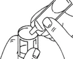 Hands holding a medication tube and a small container, from which a small amount of preparation is being squeezed directly onto the tube's opening