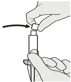 Hands removing a white cap from the top of the medical device, indicated by a black arrow pointing to the right