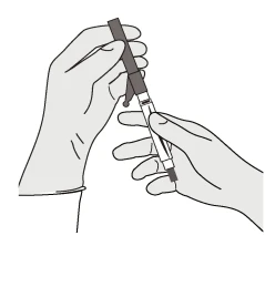 Two hands holding vertically a long syringe with a dark tip and transparent body on a white background