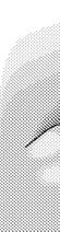 Primer plano de los labios y una parte de la mejilla representada con técnica de trama punteada en tonos de gris