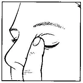 Close-up of a face in profile with a closed eye, where the index finger touches the area below the eye and on the cheek