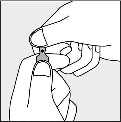 Two hands holding and breaking off a plastic safety tab from the top part of a white medication package or syringe