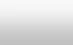 No visible elements in the image, the background is uniformly gray with a subtle gradient transitioning to white