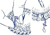 Hands opening and bending back a plastic blister pack, showing the process of removing a tablet from the pressed cavity to extract it