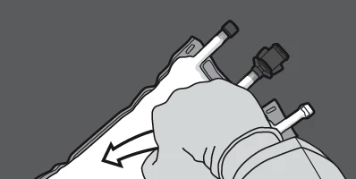 A gloved hand holding a white medication in a syringe with two needles, with a black arrow indicating downward movement on a gray background