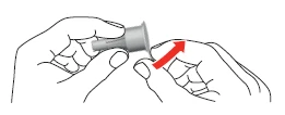 Two hands holding a medical device part, a red arrow indicating clockwise rotation to unscrew the component