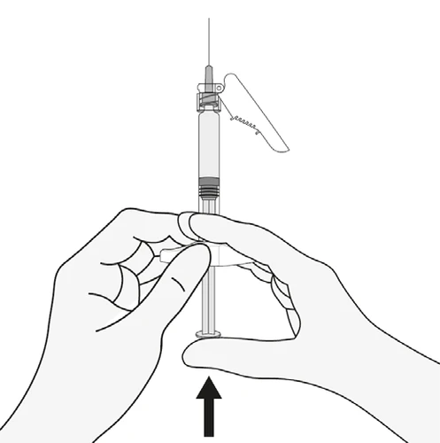 Two hands holding the syringe vertically with needle attached, one hand stabilizing the base while the other presses the plunger downward with the thumb