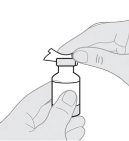 Due mani tengono un piccolo flacone con medicinale, una mano rimuove il tappo bianco dalla parte superiore del flacone