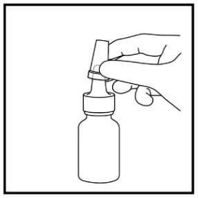 Mano che tiene un tappo e lo svita da una piccola boccetta di vetro contenente farmaco, per preparare il prodotto all'uso